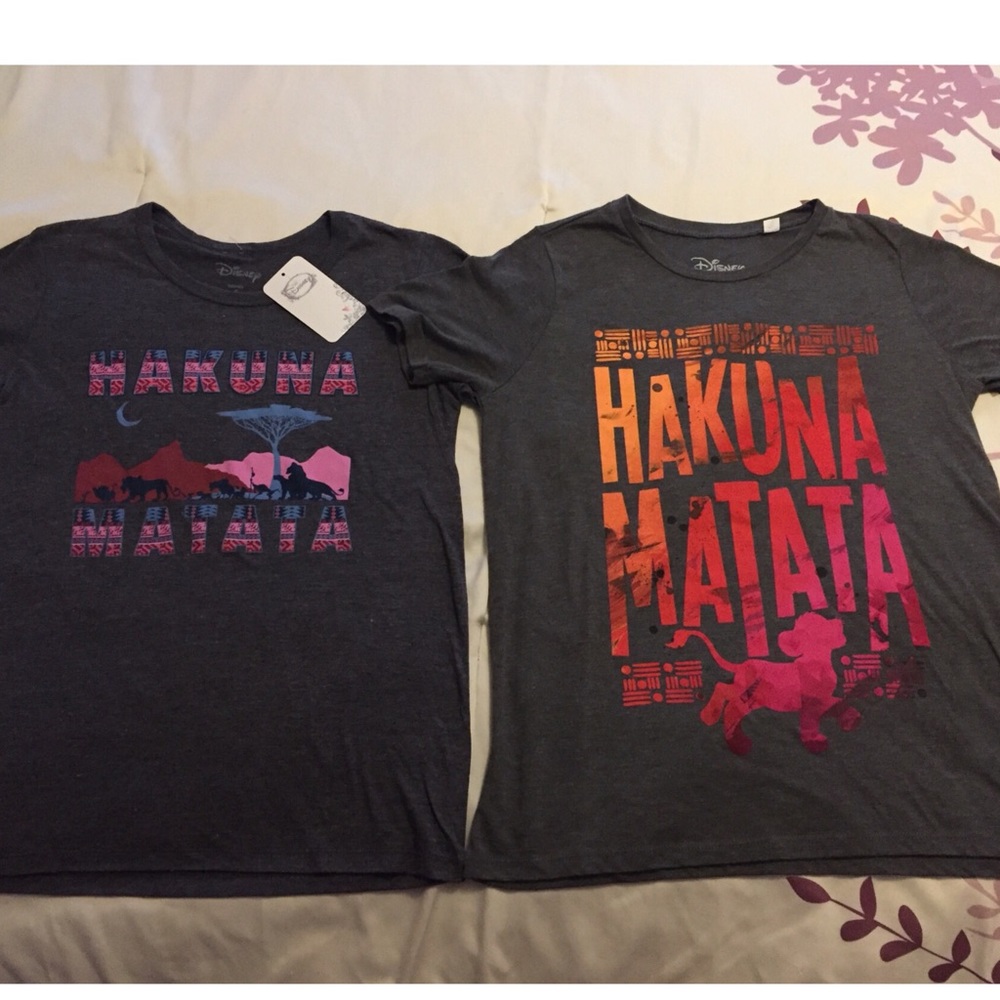 2 brand new lion king t shirts. 1 with tag 1 w/out